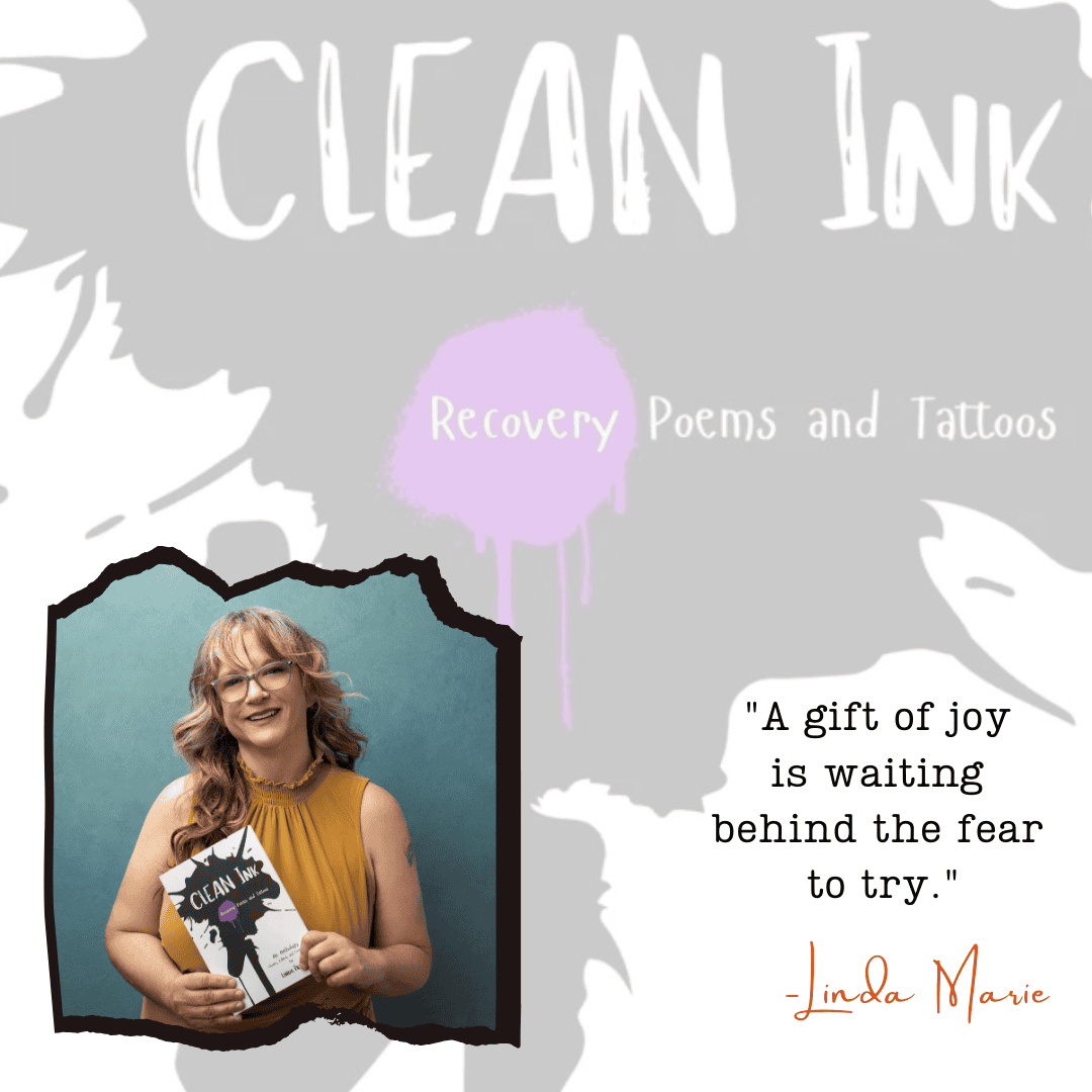 Author, Linda Phillips, holding her book "Clean Ink: Recovery Poetry Anthology"