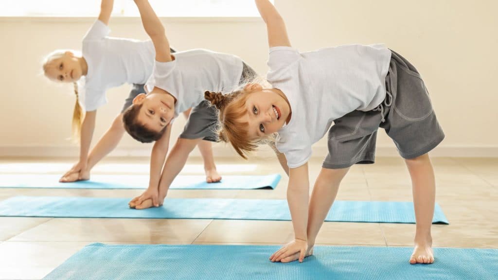 kids engaging in yoga mindful movements